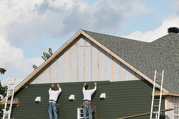 Professional Siding technician working in Lafferty, OH